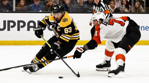 Boston Bruins captain Brad Marchand and Philadelphia Flyers forward Tyson Foerster