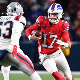 New England Patriots linebacker Christian Elliss and Buffalo Bills quarterback Josh Allen