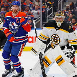 Boston Bruins goaltender Jeremy Swayman and defenseman Brandon Carlo, Edmonton Oilers forward Connor McDavid