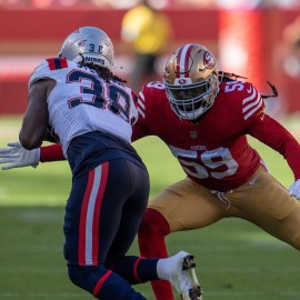 New England Patriots running back Rhamondre Stevenson and San Francisco 49ers linebacker De'Vondre Campbell