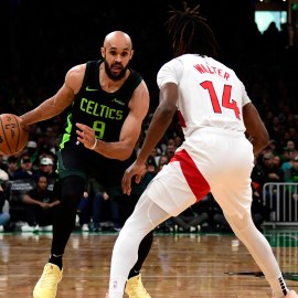 Boston Celtics guard Derrick White and Toronto Raptors guard Ja'Kobe Walter