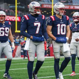 New England Patriots quarterbacks Jacoby Brissett and Drake Maye