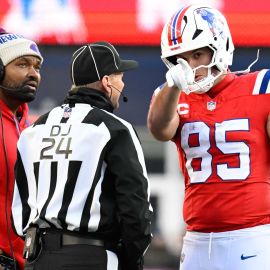 New England Patriots head coach Jerod Mayo and tight end Hunter Henry