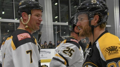 Former Boston Bruins defenseman Kevan Miller and Warrior For Life Fund All-Stars defenseman Nick Franze