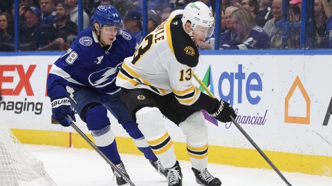 Boston Bruins forward Charlie Coyle and Tampa Bay Lightning defenseman Emil Lilleberg