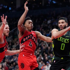 Boston Celtics forward Jayson Tatum and Toronto Raptors teammates Scottie Barnes and Jakob Poeltl