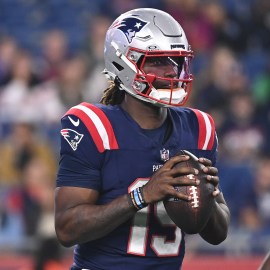 New England Patriots quarterback Joe Milton III and owner Robert Kraft