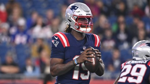 New England Patriots quarterback Joe Milton III and owner Robert Kraft