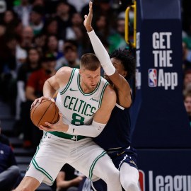 Boston Celtics center Kristaps Porzingis and Denver Nuggets forward Peyton Watson