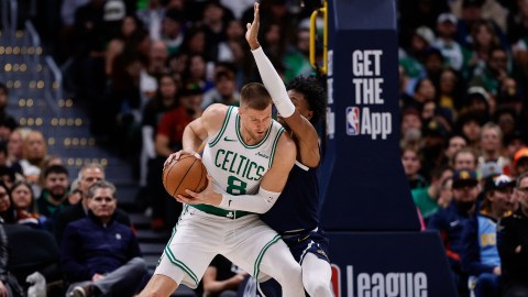 Boston Celtics center Kristaps Porzingis and Denver Nuggets forward Peyton Watson