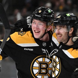 Boston Bruins defensemen Mason Lohrei and Parker Wotherspoon