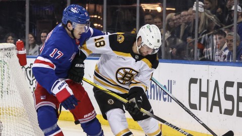 Boston Bruins forward Pavel Zacha and New York Rangers defenseman Will Borgen