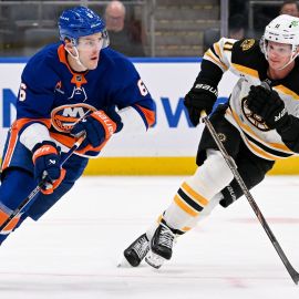 New York Islanders defenseman Ryan Pulock and Boston Bruins forward Trent Frederic