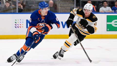 New York Islanders defenseman Ryan Pulock and Boston Bruins forward Trent Frederic