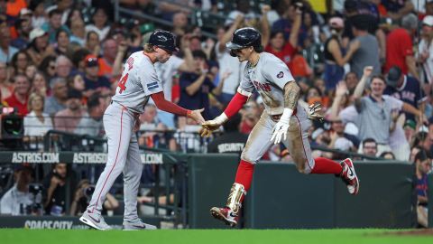 Boston Red Sox outfielder Jarren Duran and third base coach Kyle Hudson