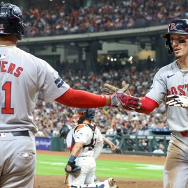 Boston Red Sox fans Rafael Devers and Jarren Duran